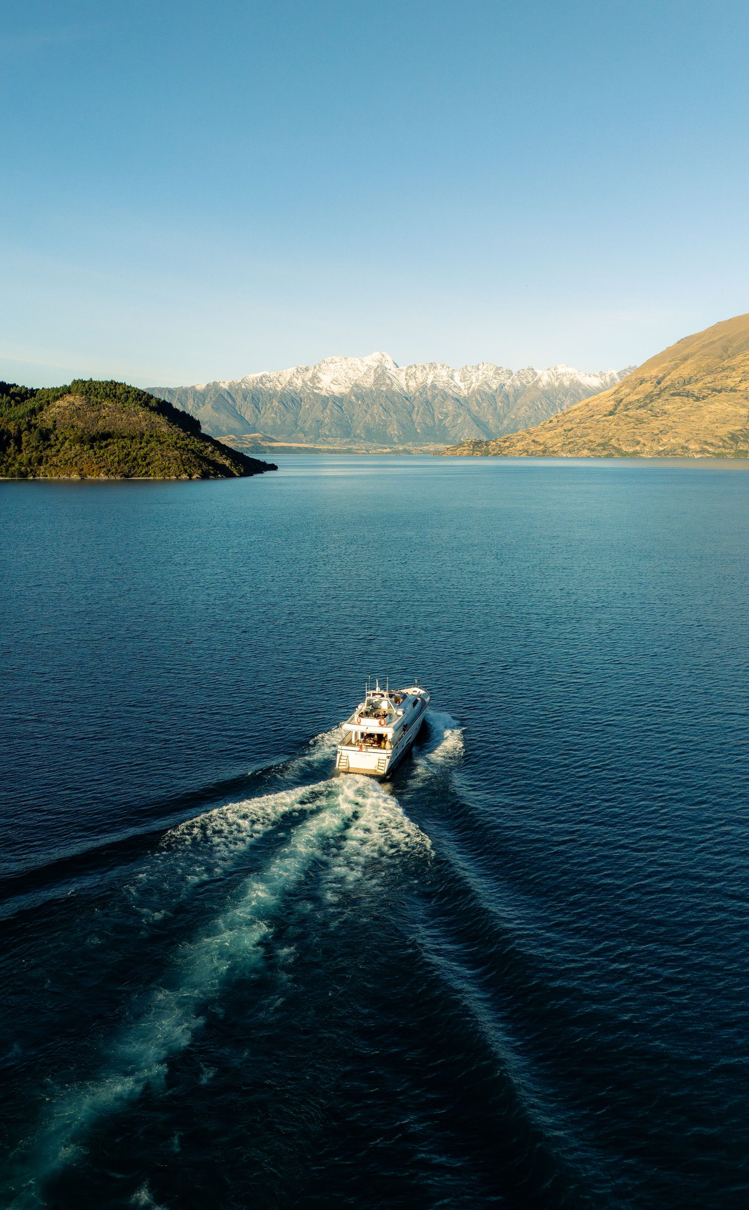 Pacific Jemm heading into Lake Wakatipu, mountains in the distance